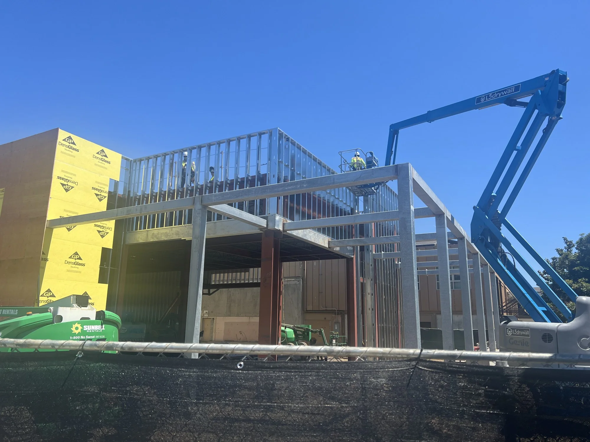 Metal framing and exterior sheathing with Level 5 lift