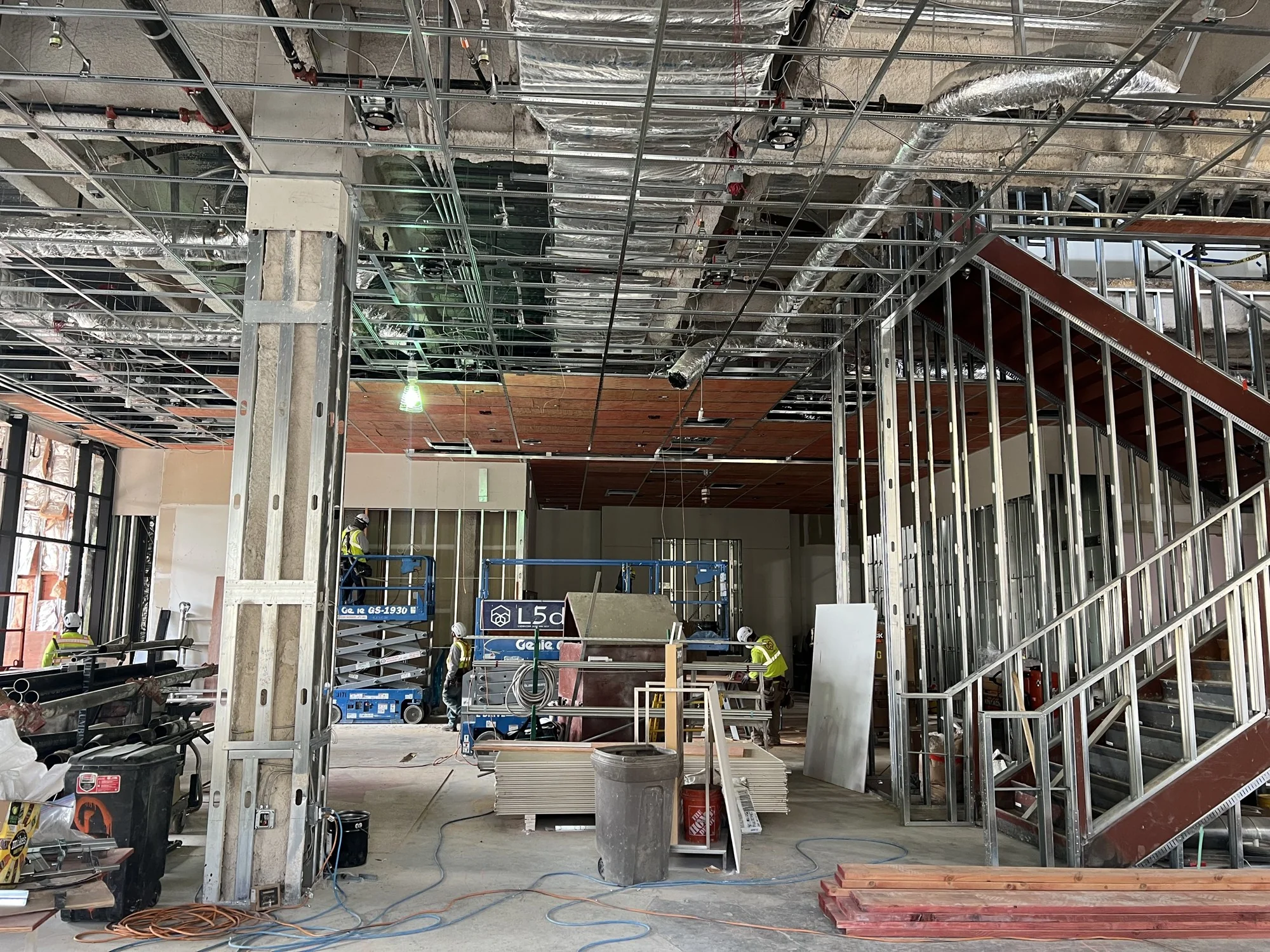 Interior wall and ceiling framing around a stair