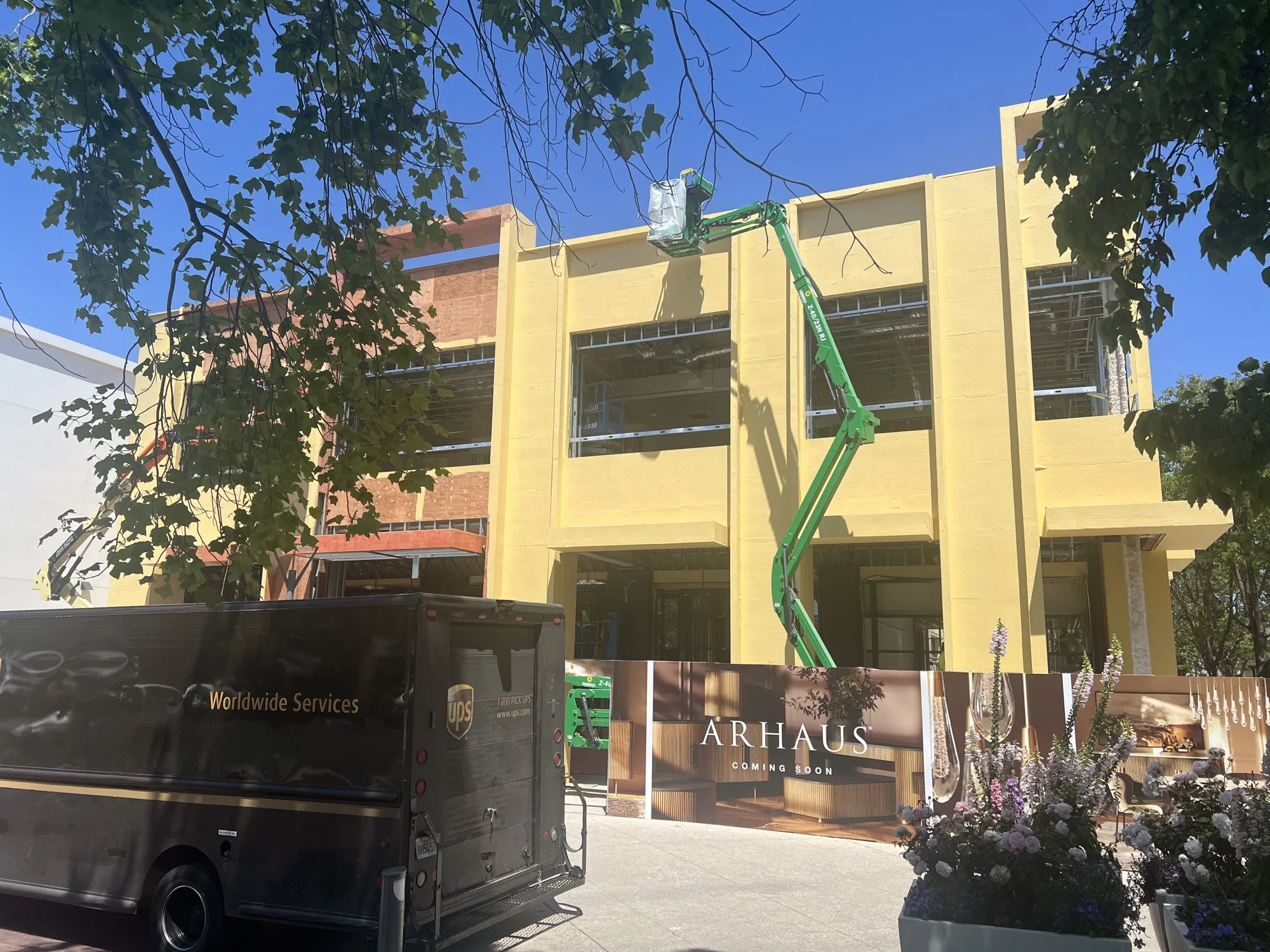 Exterior sheathing with boom lift